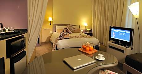 Superior Double Room with Sofa and City View