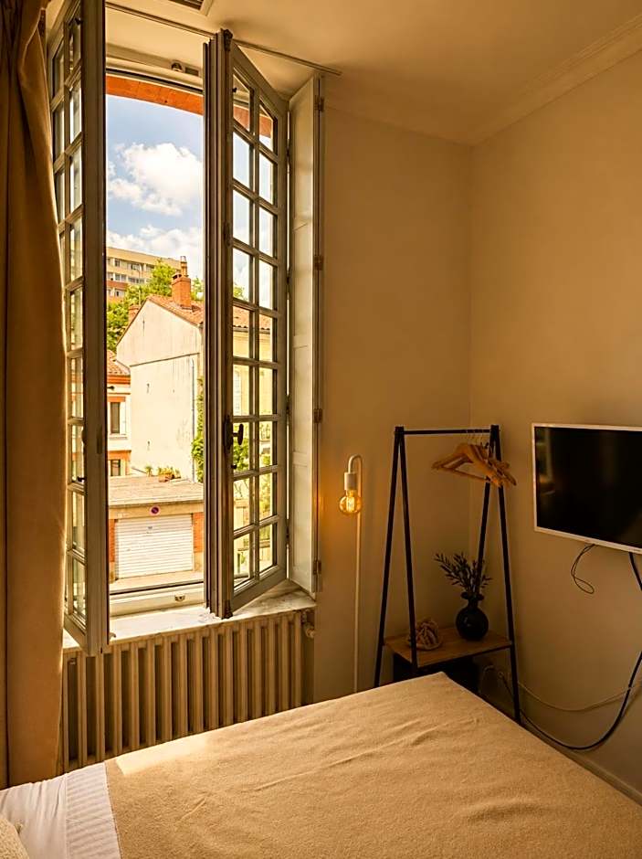 Hôtel Une Chambre en Ville