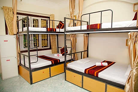 Bed in 4-Bed Dormitory Room with Balcony