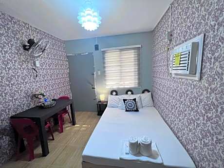 DJCI Apartelle Walk to Robinson & NE Pacific Mall 3 Min to SM Cabanatuan