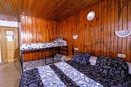 Quadruple Room (2 Adults + 2 Children)