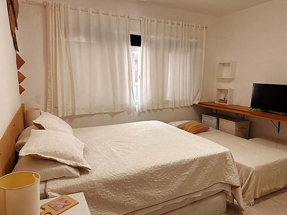 Casa Ilha| beira mar, piscina aquecida, 4 suítes