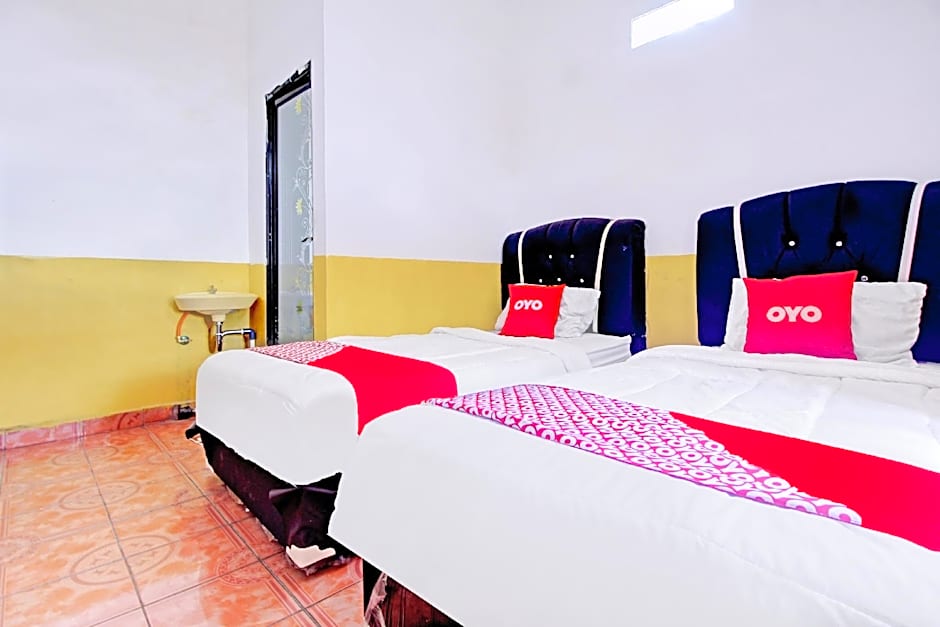 OYO 90307 Fj Alfaeyza Kost