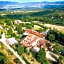 Hotel with swimming pool surrounded by greenery in San Donato Fronzano, rooms with air conditioning and breakfast included