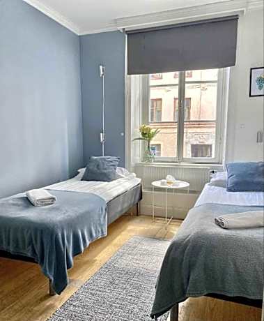 Quadruple Room with Shared Bathroom