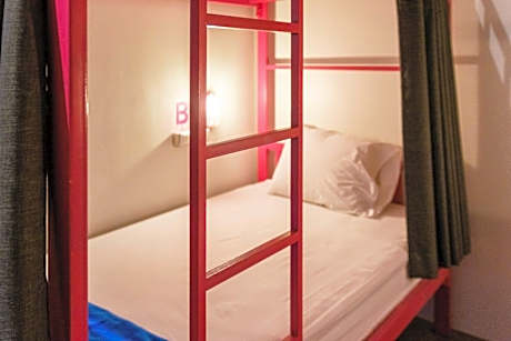 Bed in 10 Bed Mixed AC Dormitory Room with Shared Bathroom