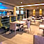 VIER Studios & Restaurant