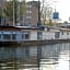 HouseBoat next to AMSTEL