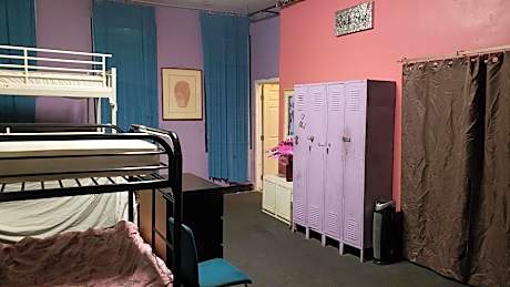 Single Bed in Dormitory Room