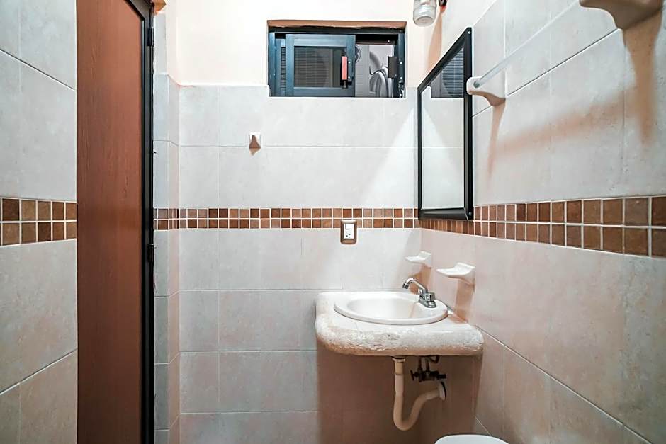 Capital O Hotel Aurora