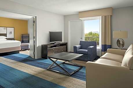 1 Bedroom Junior Suite, 1 King, Partial water view