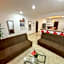 "Spacious Suite with 4 Bedrooms and Amenities"