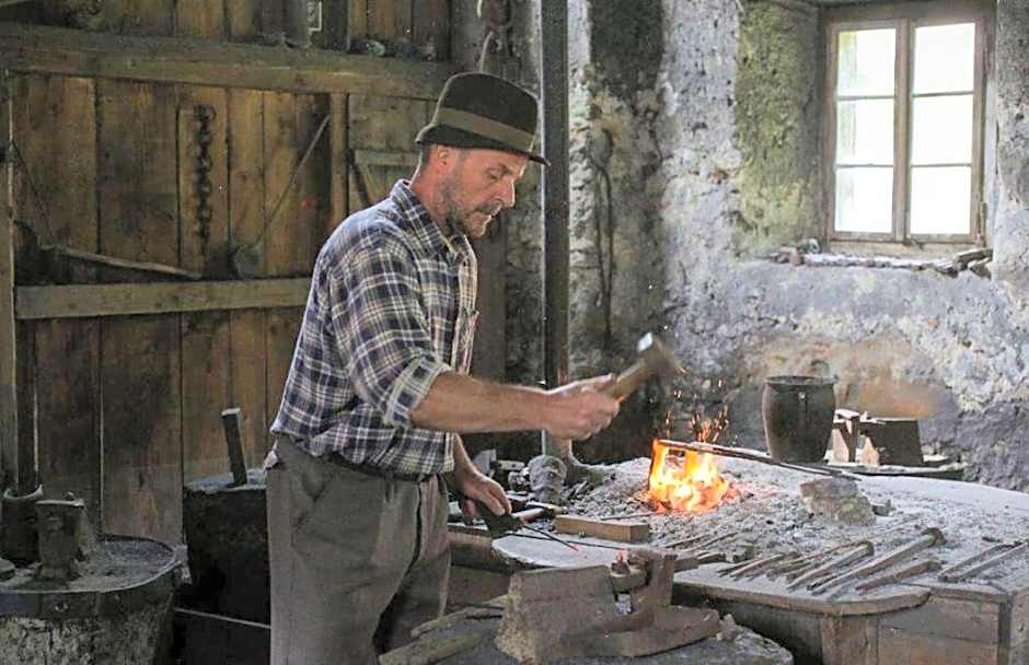 Fully equipped SIX BEDROOM HOUSE 15 kilometers from Lake Bled - with a terrace, garden, playground, and parking