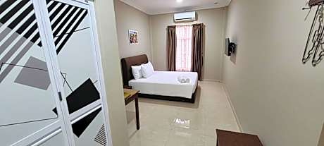 Deluxe Room (2 Adults + 1 Child)