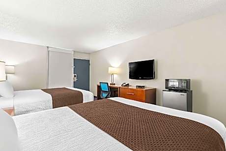 Efficiency Quadruple Room with Two Queen Beds - Non Smoking/Exterior Hall/Pet Friendly