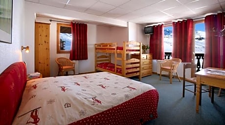 Quadruple Room (2 Adults + 2 Children)