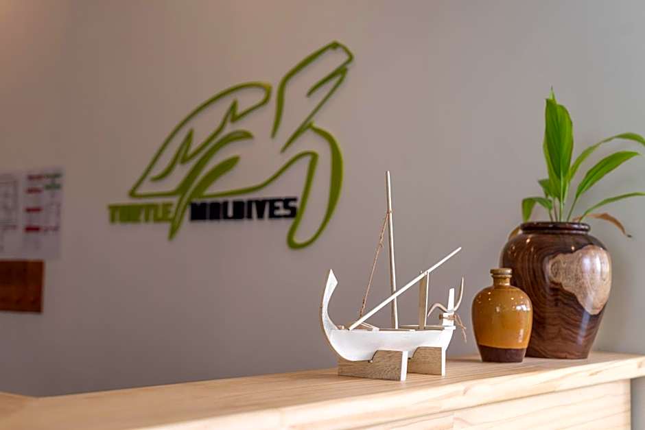 Turtle Maldives - Your Gateway to the Beach & Marine Adventures Await!