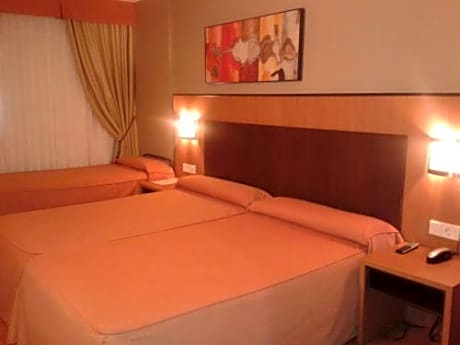 Triple Room (2 Adults + 1 Child)