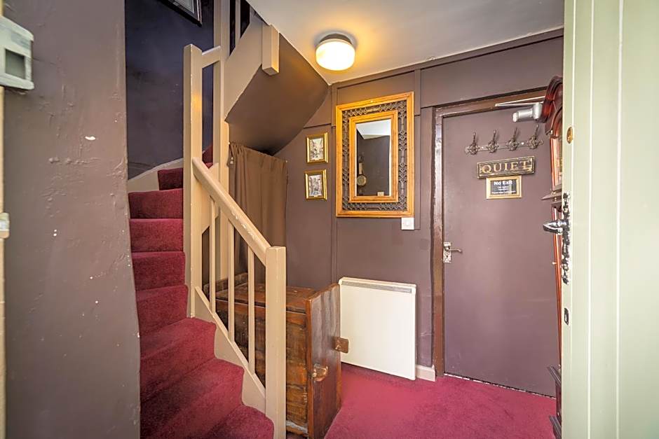 Trembling Madness Apartments