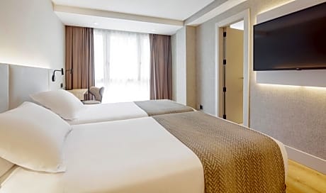 Triple Room (2 Adults + 1 Child)