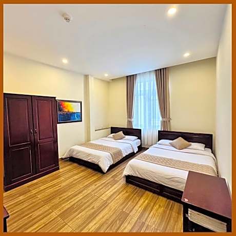 Standard Quadruple Room with Big Window and City View