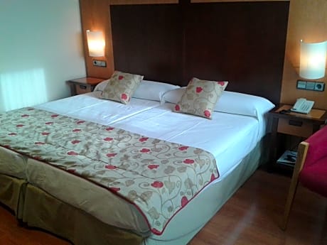 Doble con cama doble