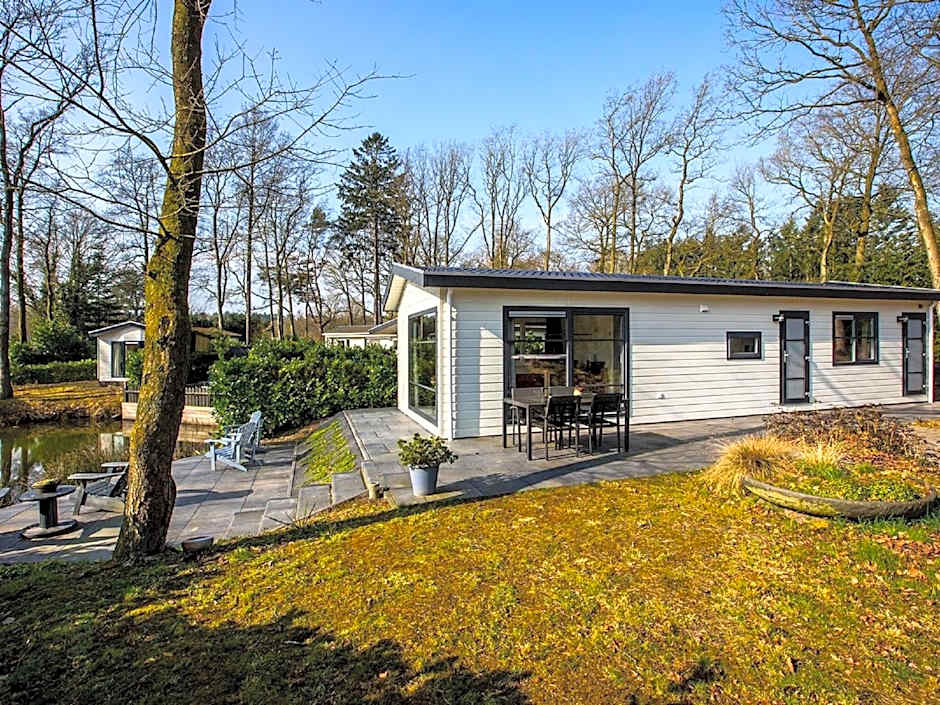 Modern chalet with two terraces and near a pond