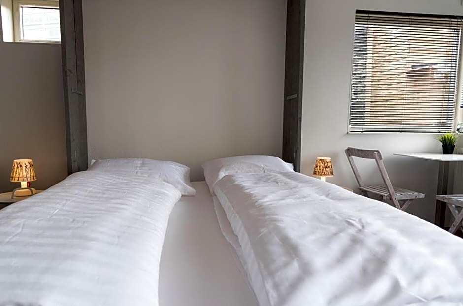 HouseBoat next to AMSTEL