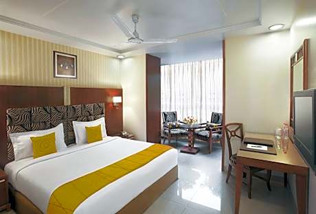 Deluxe Double or Twin Room with 10% off on Food and Soft Beverage , Laundry and Spa per stay.