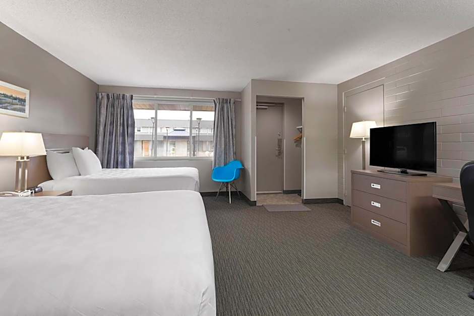 Photo 1 of 4 of Deluxe Queen Room with Two Queen Beds and Kitchenette - Non-Smoking