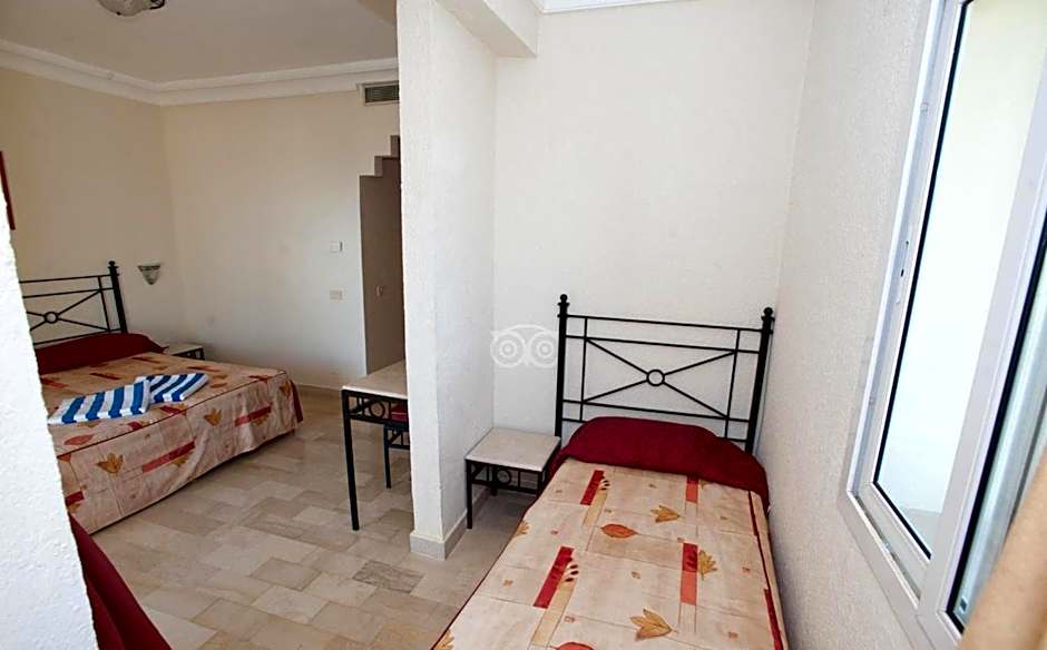 Photo 1 of 7 of Triple Room