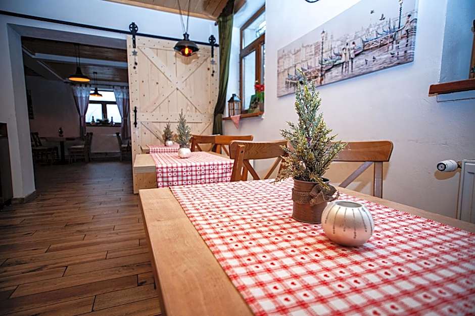 Hostinec pod úbočou