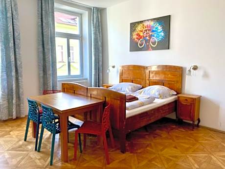 Quadruple Room with Private Toliet and Shared Bathroom