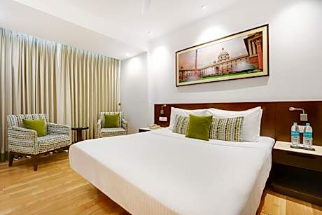 Executive Suite with 15% Off on F&B, 02 pcs laundry, High tea with snacks, Happy Hours 1+1 IMFL, 02 Glass of Beer OR 2 - 30ml IMFL liquor & Late Check-Out by 02 hours Subject to availability