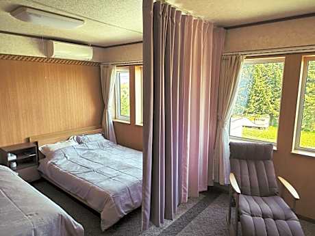 Quadruple Room with Shared Bathroom