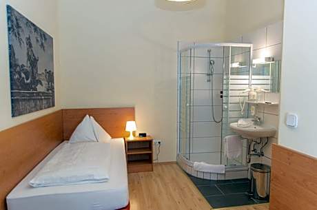 Small Single Room with Shared Toilet