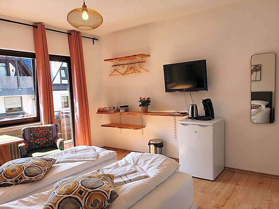 Römerstube Apartments & rooms