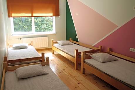 Single Bed in Dormitory Room