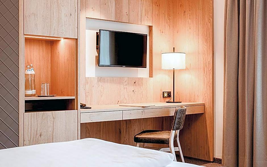 Österreichischer Hof-im Bademantel direkt in die Alpentherme