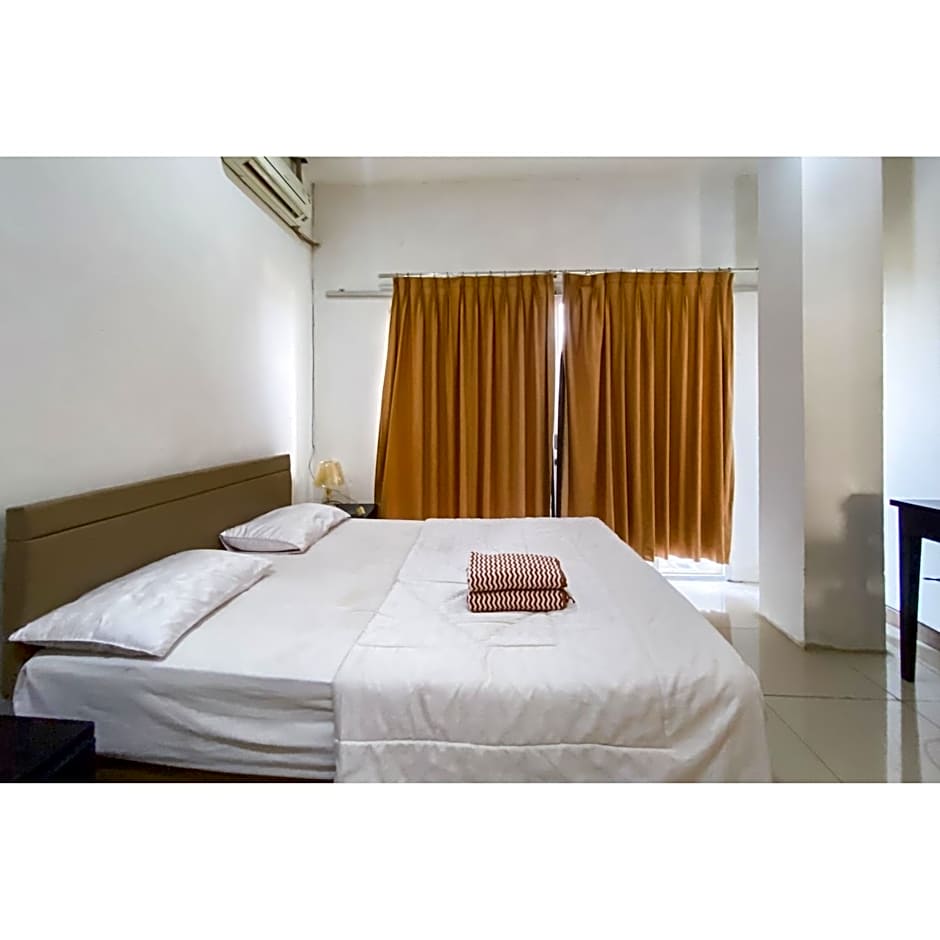 Curves Residence Mitra RedDoorz