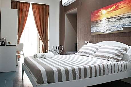 Deluxe Room (2 Adults + 1 Child)