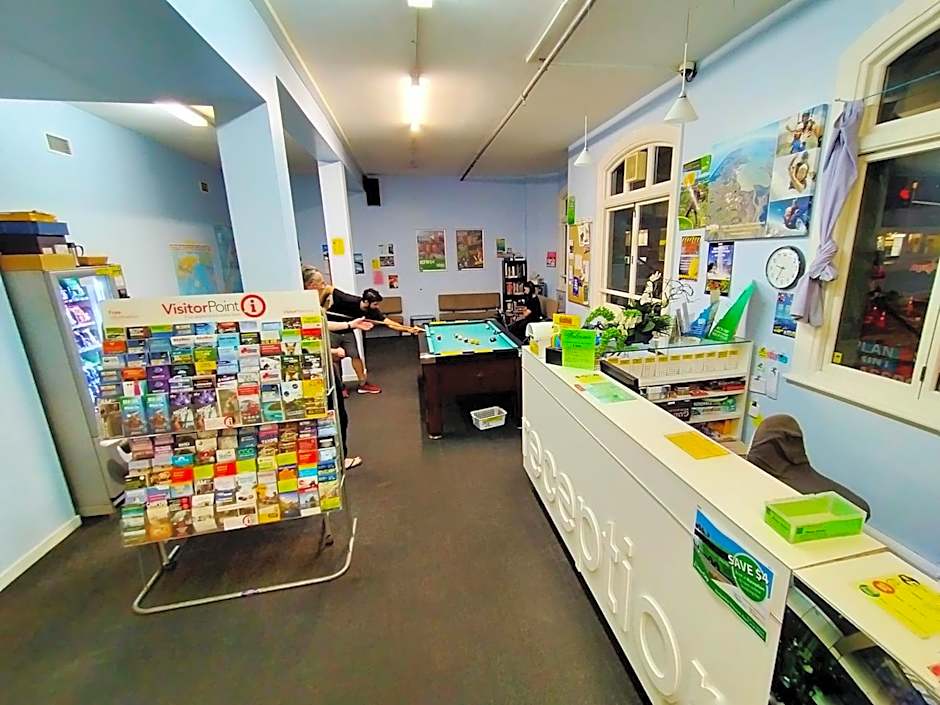 Surf 'N' Snow Backpackers Across Sky Tower