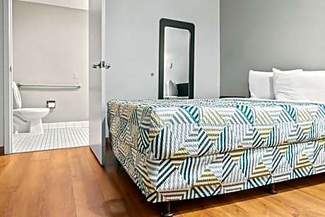1 Full Bed | ADA/RI Shower/Mini Fridge