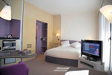 Deluxe Room with Queen Bed and Sofa Bed