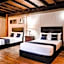Capital O Hotel Villa Azura