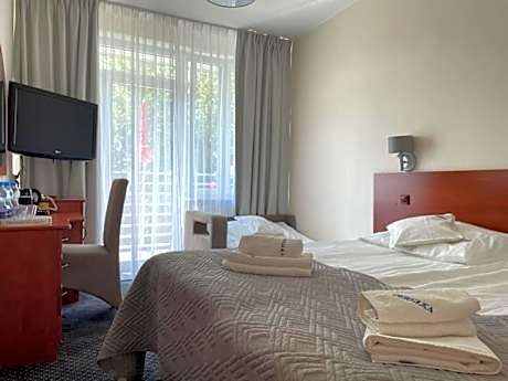 Double Room with Balcony (2 Adults + 1 Child)