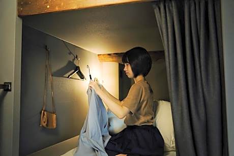 Single Bed in Female Dormitory Room