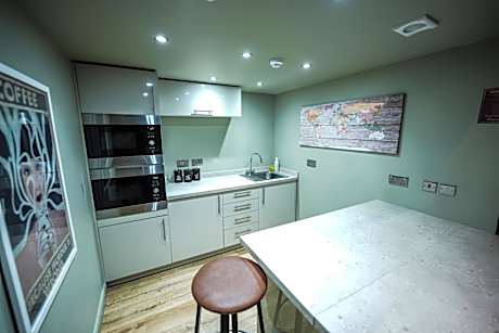 Private Full dorm for 18 people (Triple Bunk ensuite mini kitchen)