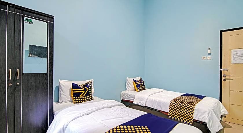 Hotel O Penginapan Puti SyariahNearBandara Sultan Syarif Kasim II