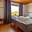 Comfortable guest rooms with fully equipped kitchen and cosy living room.